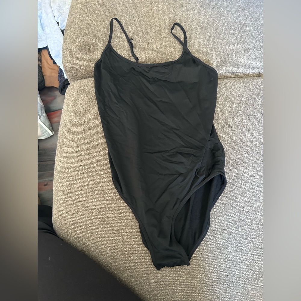 Black body suit.